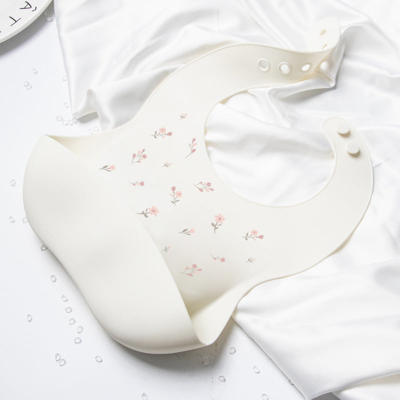 Babero Plástico Petal Splash Blanco Ref. BA5