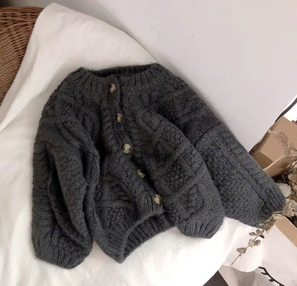 BUZO TEJIDO TRENZA GRIS