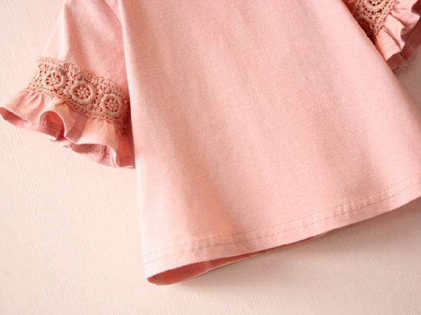 CAMISETA ROSADA TEJIDA EN LA MANGA