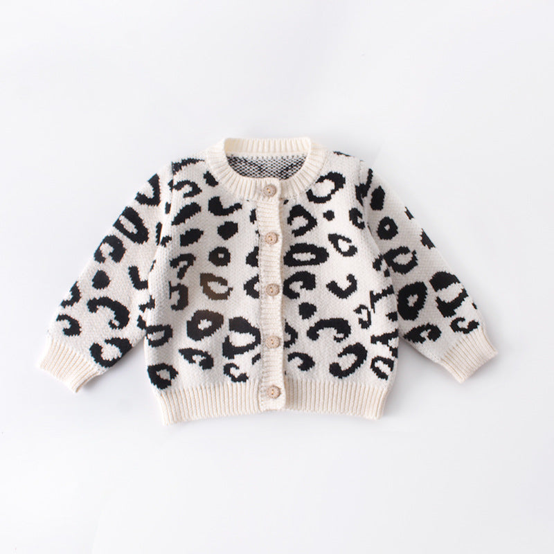 BUZO CON BOTONES ESTAMPADO DE LEOPARDO CREMA CON NEGRO - BUZO | Acuarella
