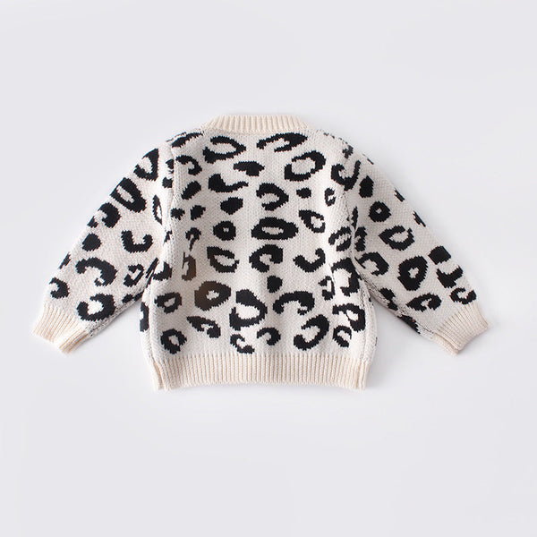 BUZO CON BOTONES ESTAMPADO DE LEOPARDO CREMA CON NEGRO - BUZO | Acuarella
